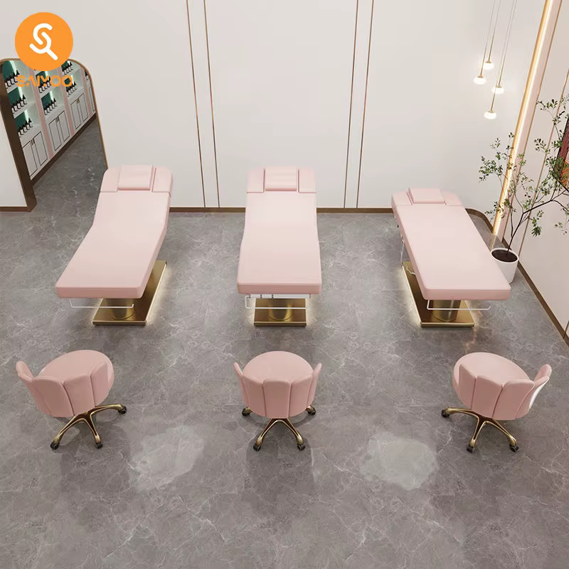 Lit de massage de beauté en cuir rose à 4 moteurs de luxe avec base en acier inoxydable à double cylindre