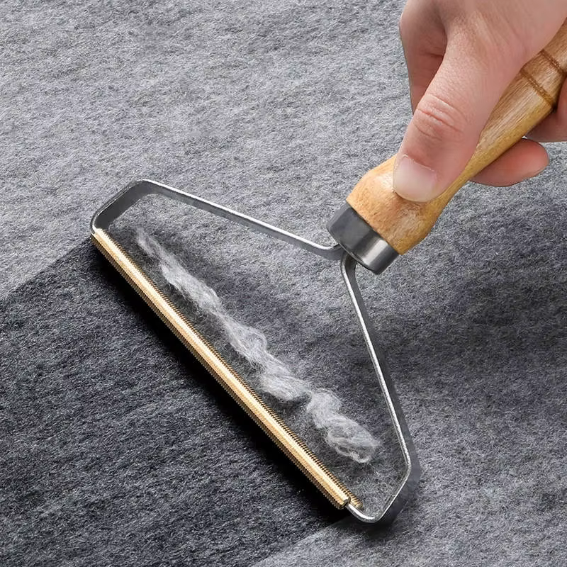 Éliminateur de peluches portable